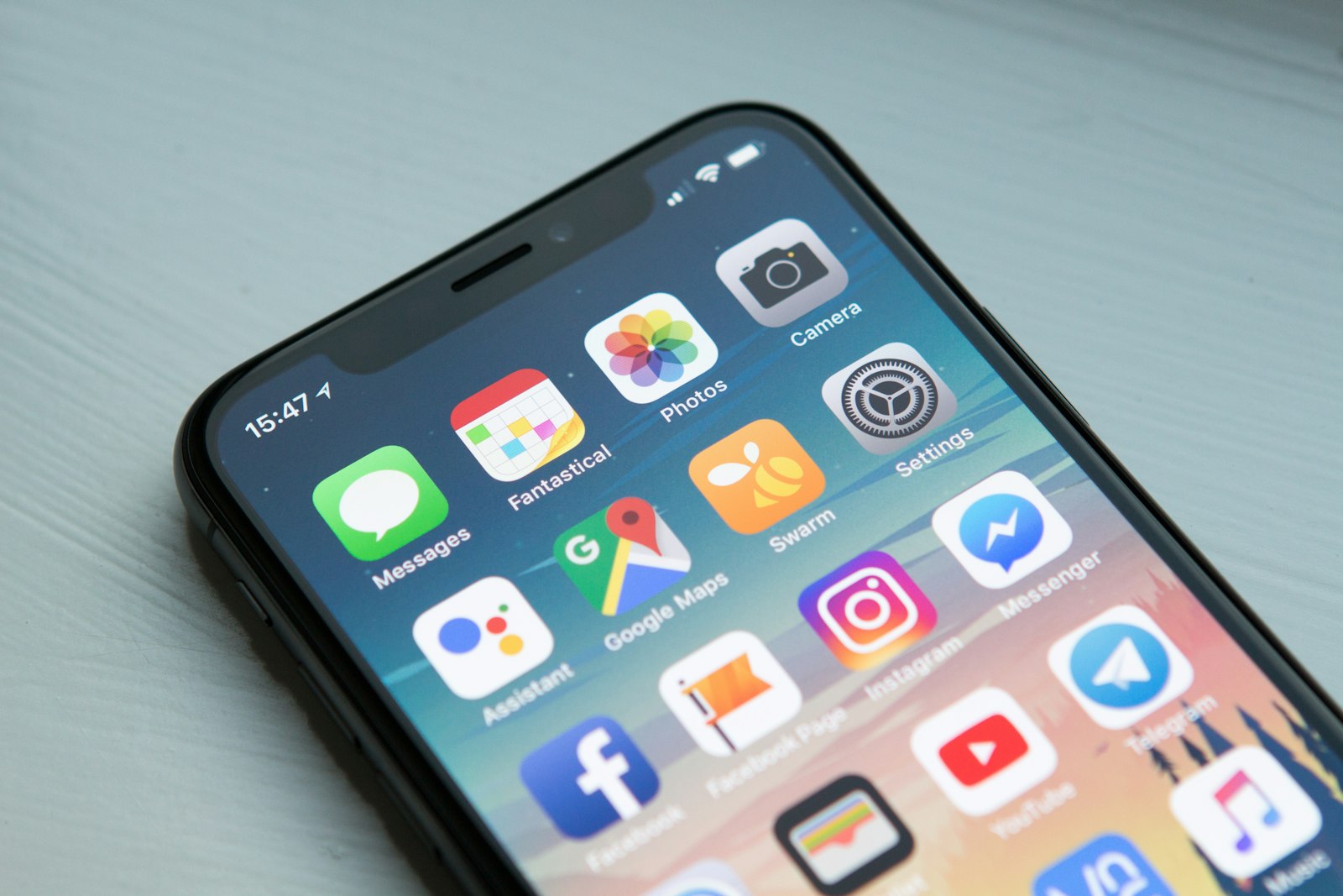 Person holding a smartphone — Add to Home Screen guide